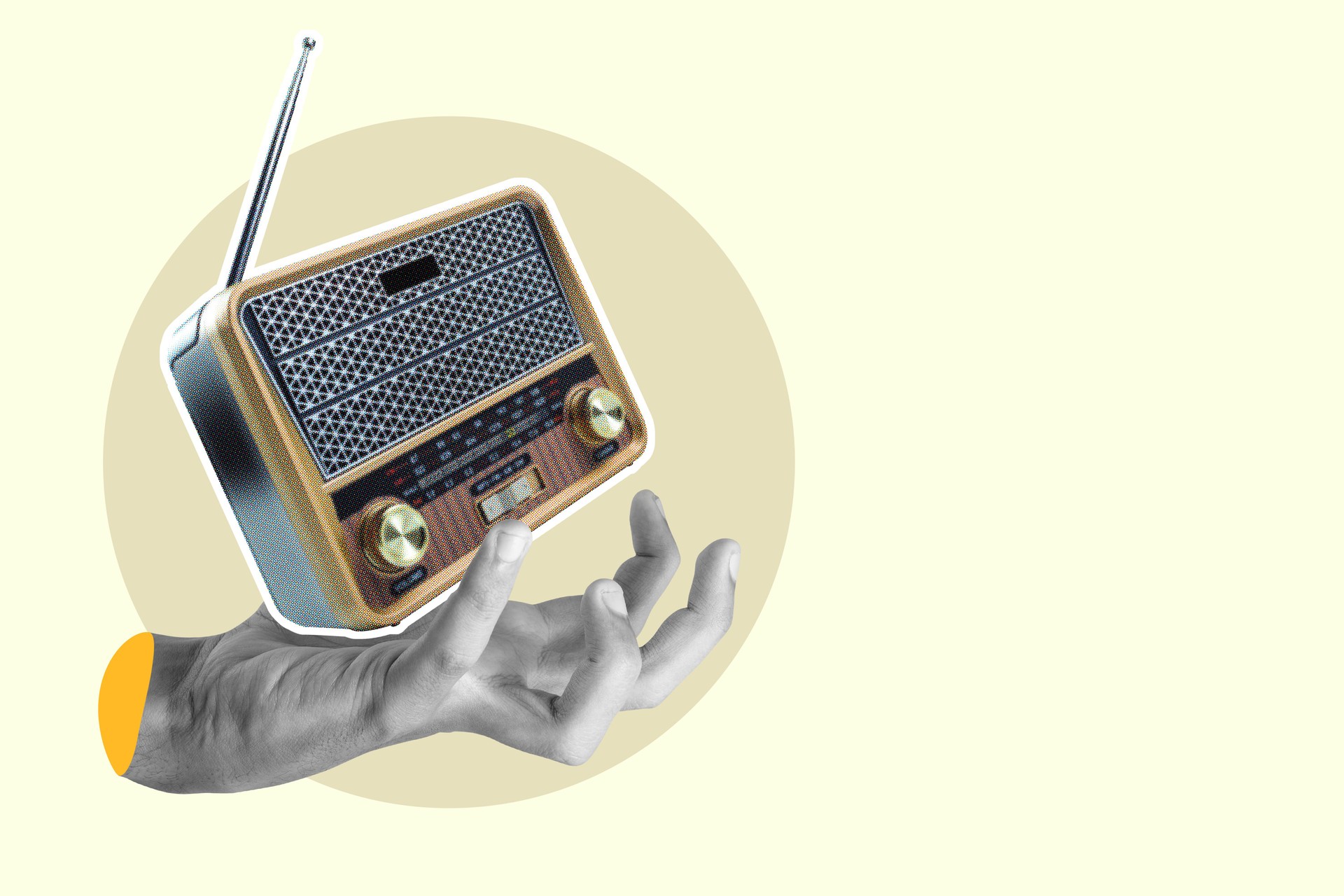 Hand holding vintage radio on abstract background