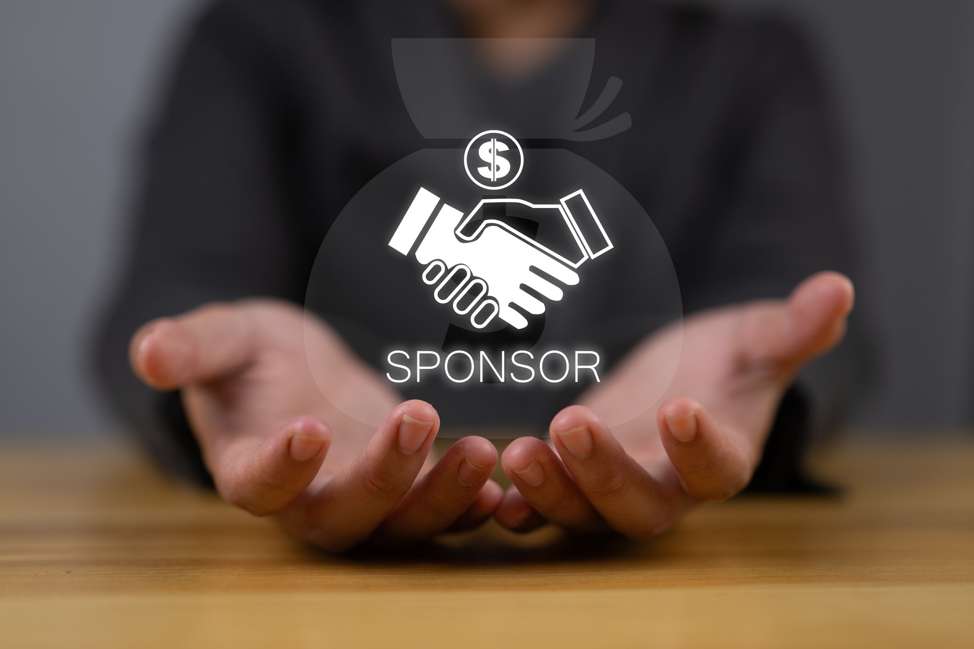 Sponsorship concept. Business between fund sponsors Resources or services. Businessman showing sponsor icon on virtual screen.